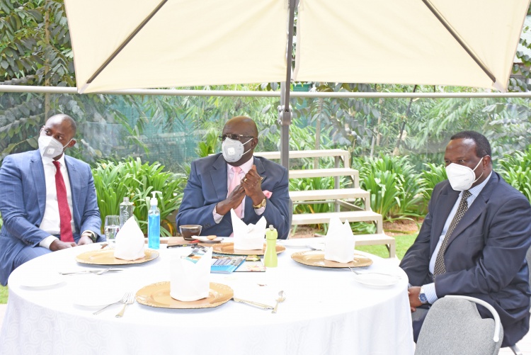 Education CS Prof. George Magoha and College of Health Sciences Principal Prof. James Machoki follow proceedings during the launch of save a doctor save a life campaign.