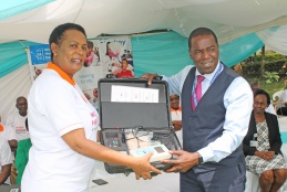 Dr. Sarah Ndegwa (L) hands over a donation of audiology machine from the University of Nairobi to KNH CEO Dr. Evanson Kamuri during the World Hearing Day 2020.