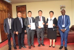 FHS Associate Dean Postgraduate Research and Training Prof. Evelyn Wagaiyu with Wondfo Biotech Senior Vice President Mr. Zaping Xha, Vice President Mr. Wenjie Xu, Global Technical Director Mr. Leo Xu and Dr. Parmenas Okemwa and Dr. Francis Wanyama from FHS posing for a picture after signing the MoU. 