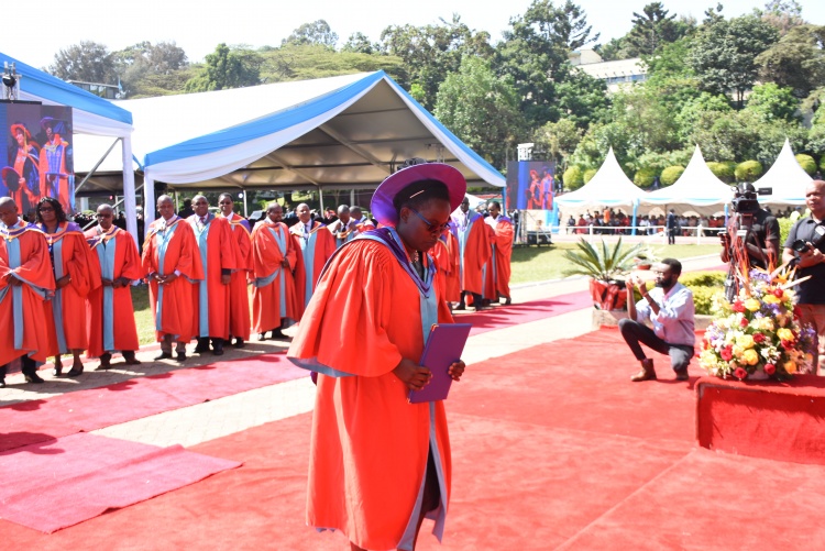 Dr. Angeline Chirchir after being conferred with a PhD. 