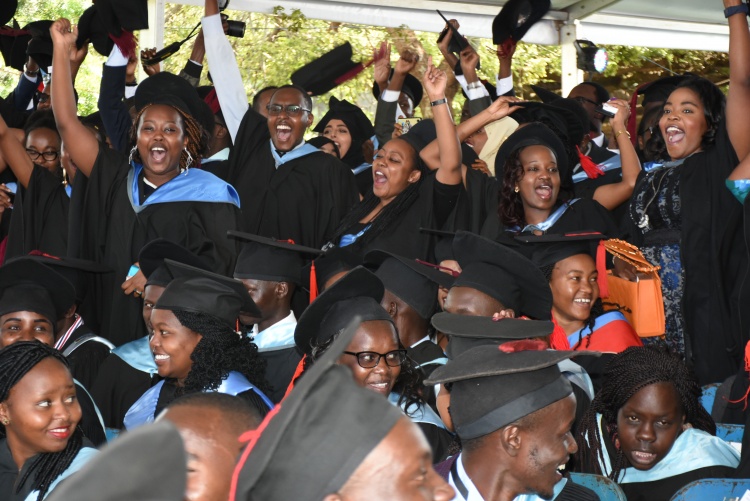 Graduands in jubilation.