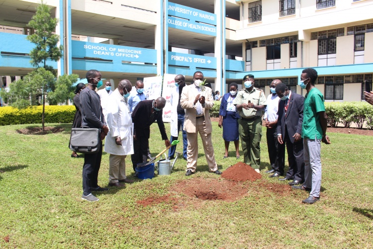 College of Health Sciences Principal, Prof. James Machoki leads staff and students in tree planting exercise.