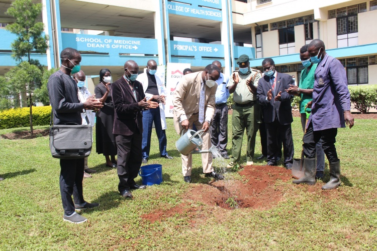 College of Health Sciences Principal Prof. James Machoki leads staff and students in tree planting drive.