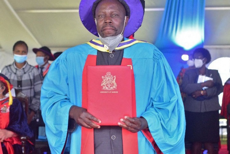 Professor Fredrick Were being conferred with the Degree of Doctor of Science during the 65th University of Nairobi graduation ceremony.
