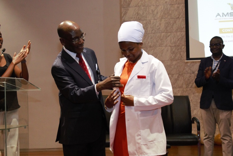 The Deputy Vice chancellor claoking a student 
