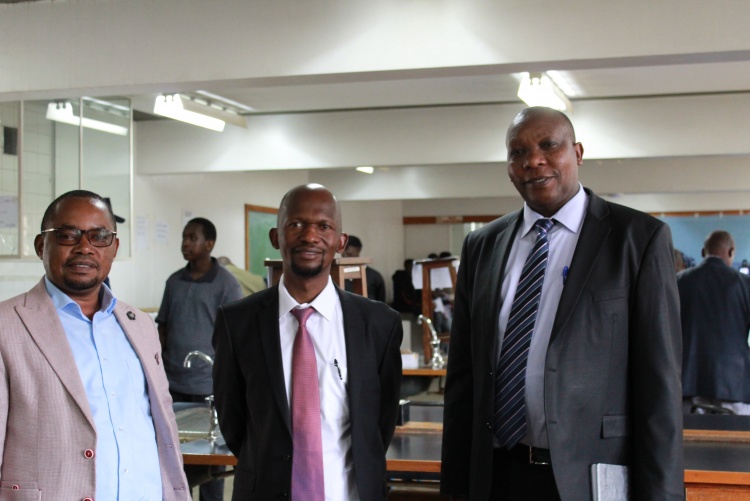 Faculty Dean and colleagues during admission