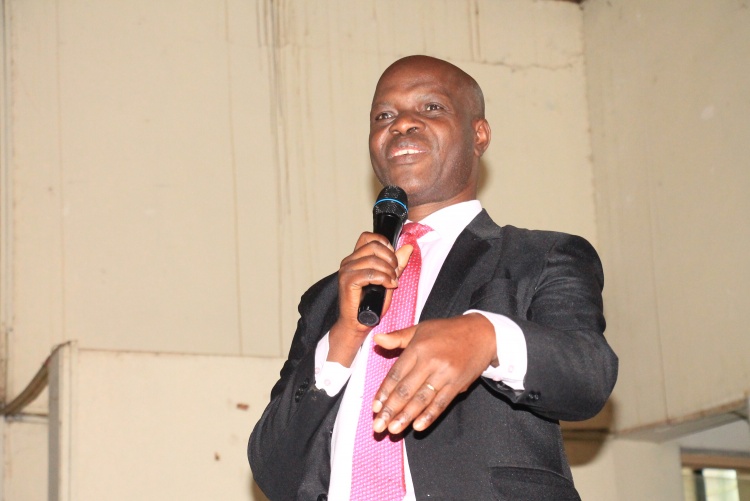 FHS Dean Prof. Daniel Ojuka addressing the FHS First-year students during the Welcome address and orientation meeting. 