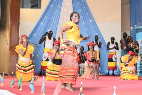 International students from Uganda performing a traditional dance.