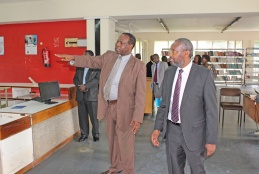 College of Health Sciences Principal, Prof. James Machoki (L) shows the University of Nairobi Vice Chancellor Prof. Stephen Kiama some of the renovations done in the college library.