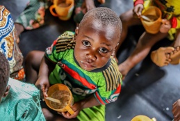 A snapshot of a child eating.