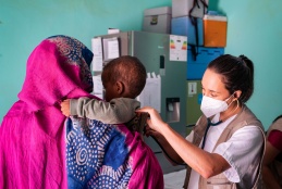 A child having a medical exam.